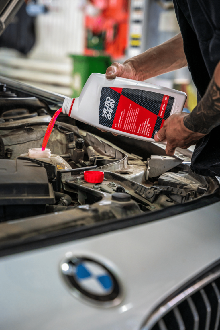 A car's engine with a cooling system and radiator fluid