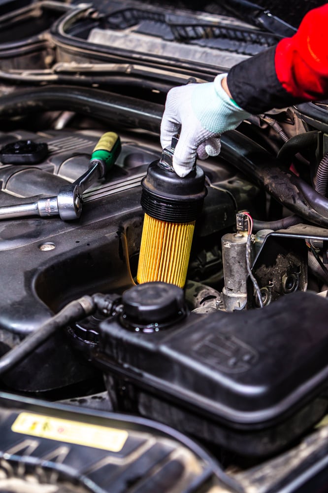 Putting the new Mahle oil filter in BMW X3