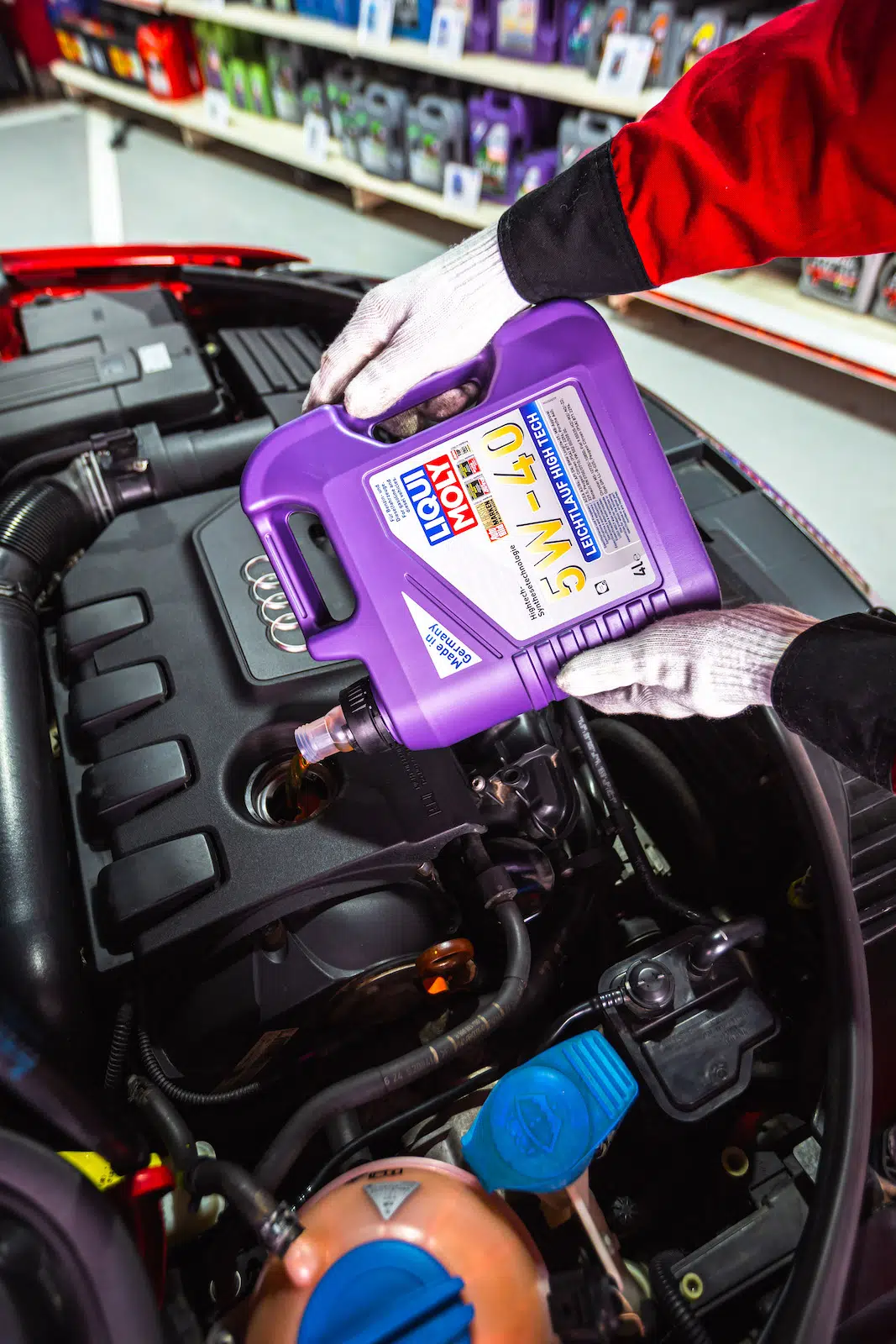 LIQUI MOLY Leichtlauf High-Tech 5W-40 being poured into an Audi A3