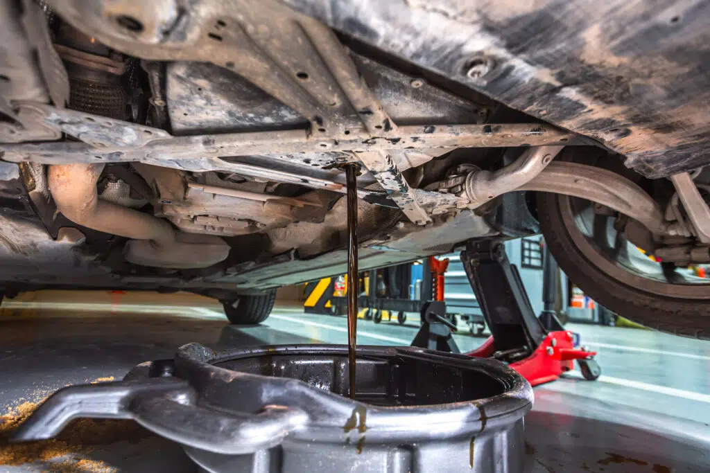 An engine oil pouring out of an Audi A3