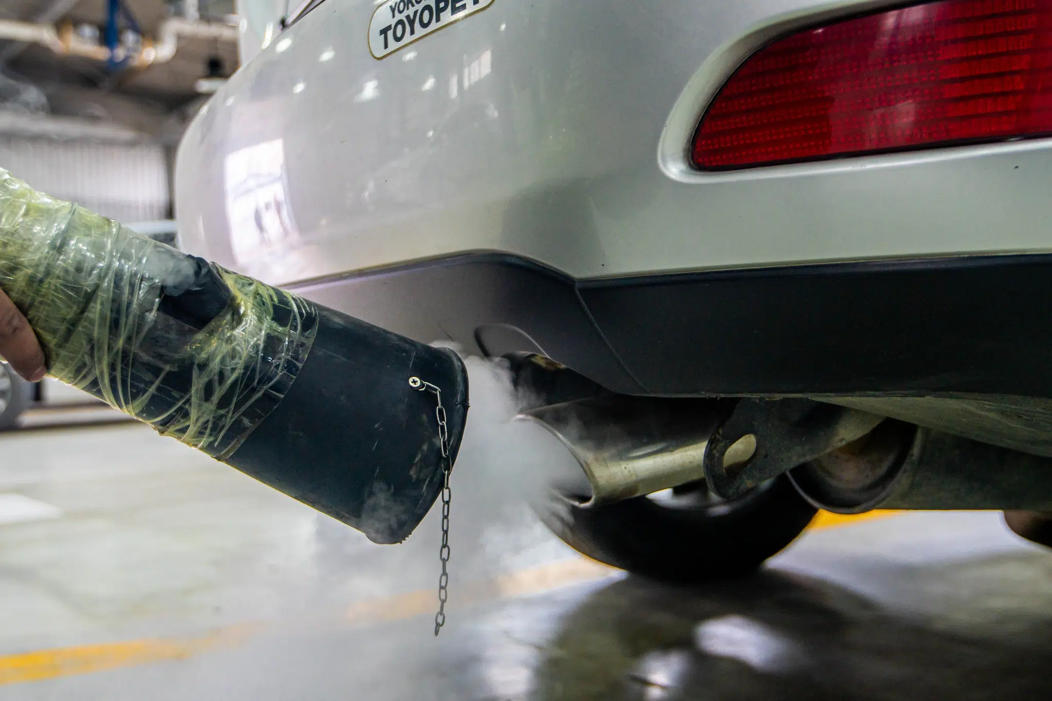 Clean the catalytic converter before the emissions test with adding a strong catalytic system cleaner with enough fuel to the tank