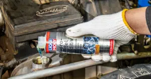 A picture of a hydraulic lifter oil additive to be added during or after oil change