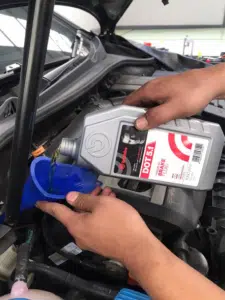 An image showing the container of brake fluid 3 dot, a type of hydraulic fluid used in automotive brake systems, highlighting its composition and properties.